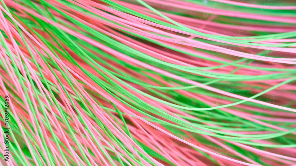 synthetic textile thread, thread at industrial weaving manufacturing machine, textile fabric production industrial concept background synthetic textile thread, thread at industrial weaving manufacturing machine, textile fabric production industrial concept background