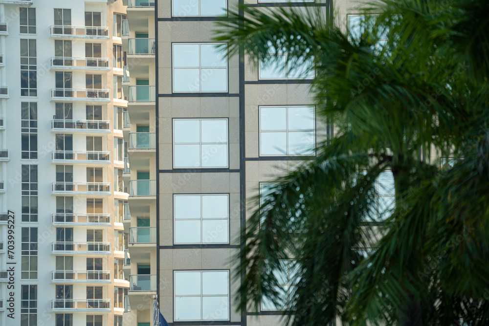 Obraz premium Miami city with luxurious high-rise hotels and condo buildings on Atlantic ocean shore. American tourism infrastructure in southern Florida