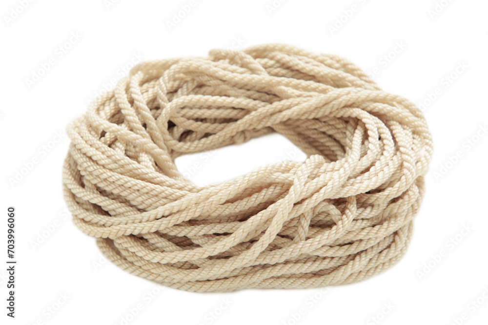 Coil of rope isolated on a white background close up