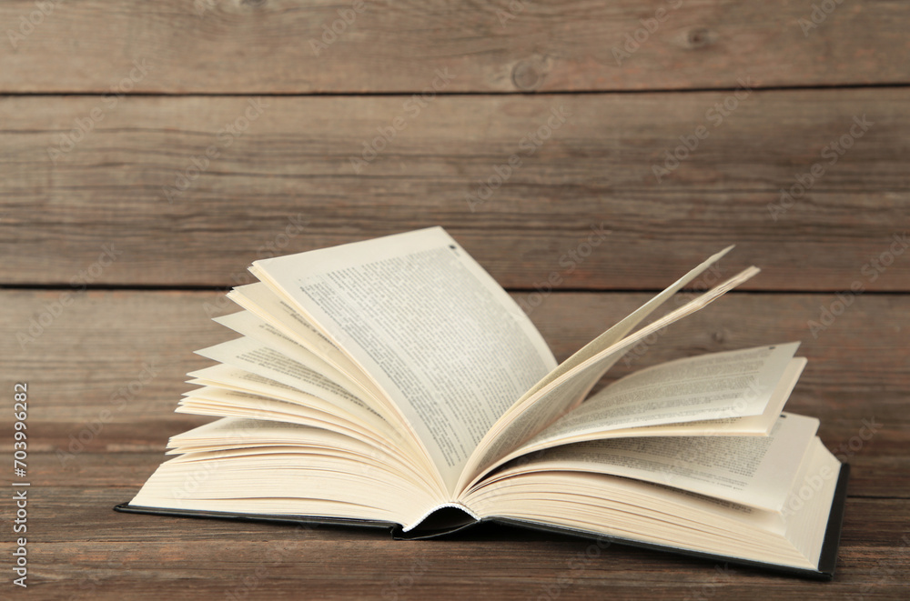 Open book on grey wooden background. Space for text Open book on grey wooden background. Space for text