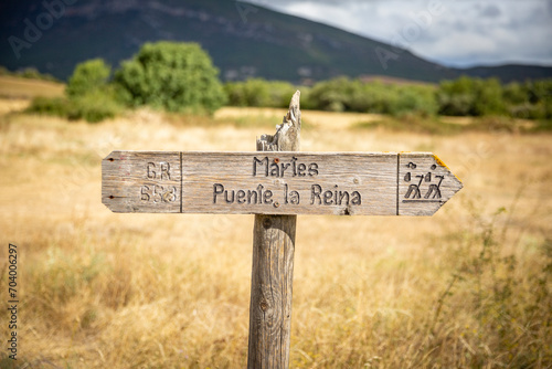 Via Tolosana - Way marker of Arles GR653 long-distance footpath pointing the way to Martes and Puente la Reina, Spain photo