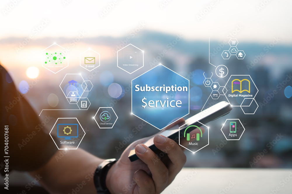 Subscription business model concepts.Close-up of man hands using mobile phone Subscription business model concepts.Close-up of man hands using mobile phone