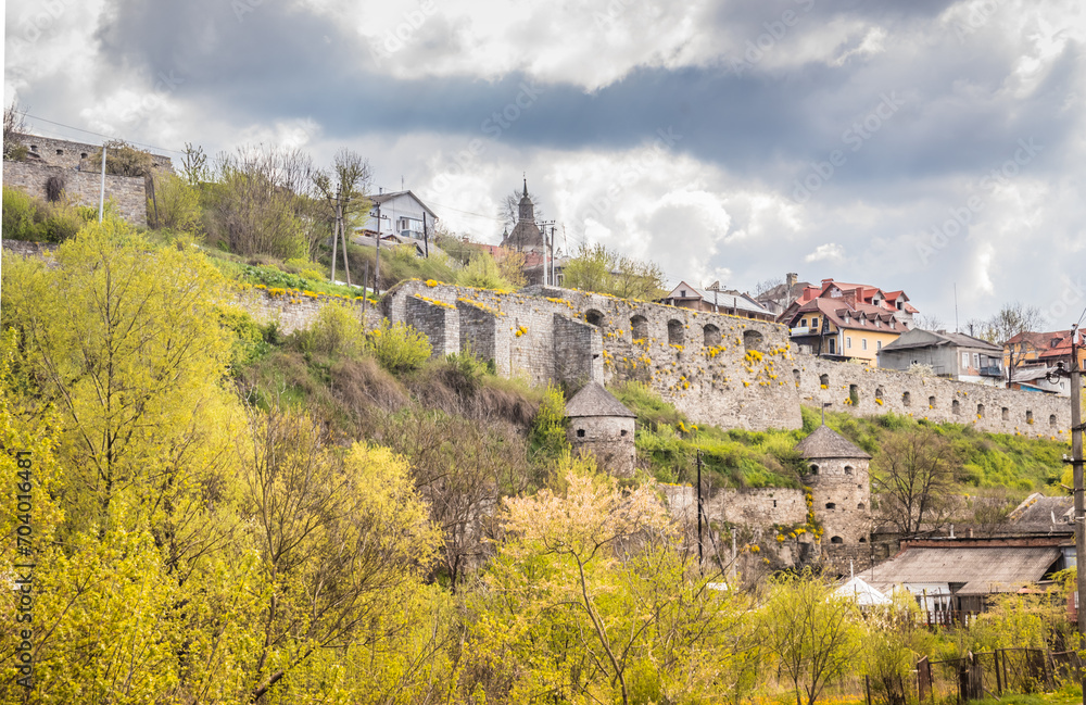 Fortifications and towers near the Kamianets-Podilskyi Castle. Part of the powerful bastions of the castle. The fortress located among the picturesque nature in the historic city of Kamianets-Podilsky