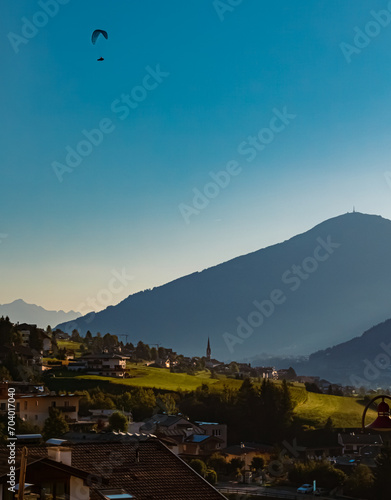 Alpine summer view with a paraglider near Fulpmes, Stubaital valley, Innsbruck, Tyrol, Austria