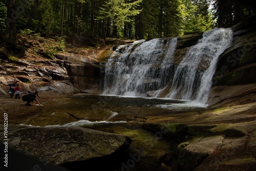 waterfalls on a stream in the forest © Tylinek