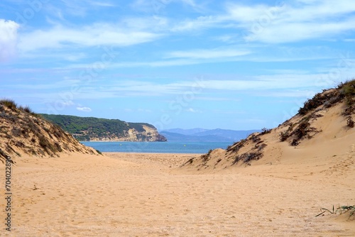 beach access near Faro de Trafalgar with a view to Cala del Varadero and cliffs and mountains behind the bay of the Atlantic, Zahora, Conil de la Frontera, Vejer de la Frontera, Costa de la Luz, Spain