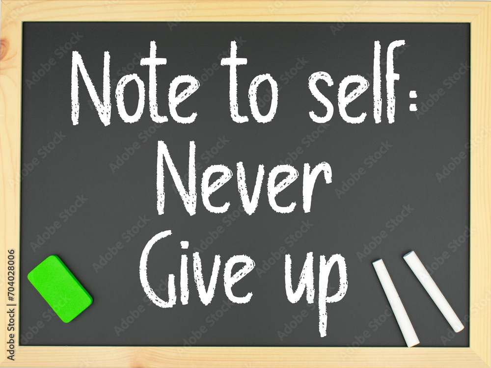 Obraz premium Blackboard with the words note to self: never give up written in white with two chalks and a green eraser