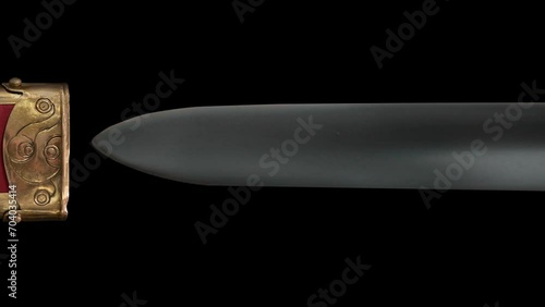 Ancient Ornate Sword Being Moved In And Out Of A Scabbard, With Alpha Channel