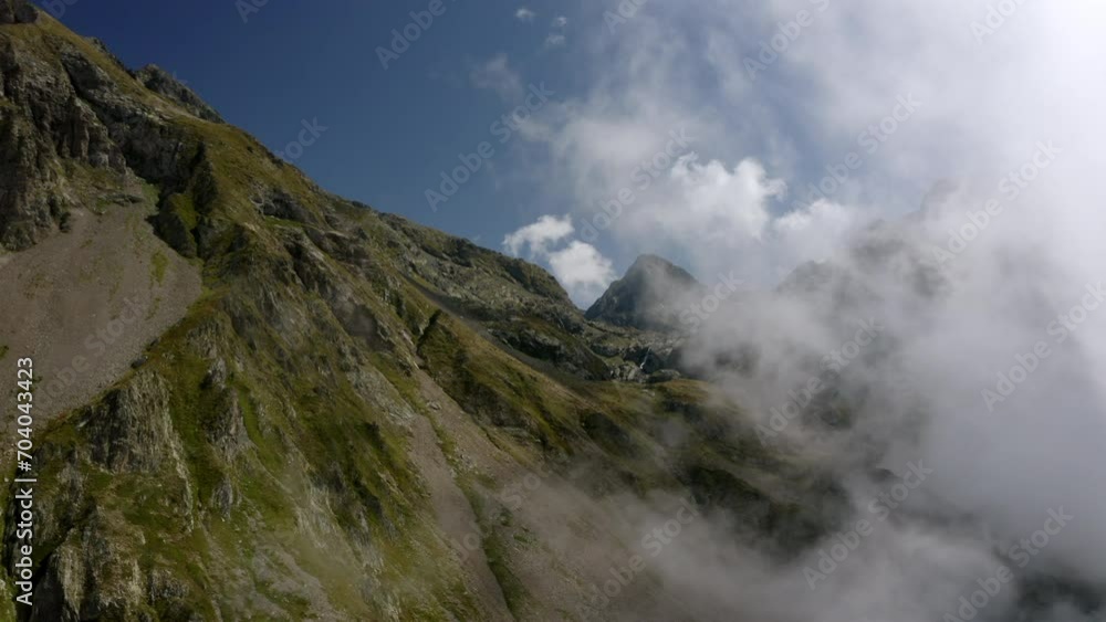 Aerial Forward Idyllic Shot Of Natural Rock Formations In Clouds On Sunny Day - French Alps, France Aerial Forward Idyllic Shot Of Natural Rock Formations In Clouds On Sunny Day - French Alps, France