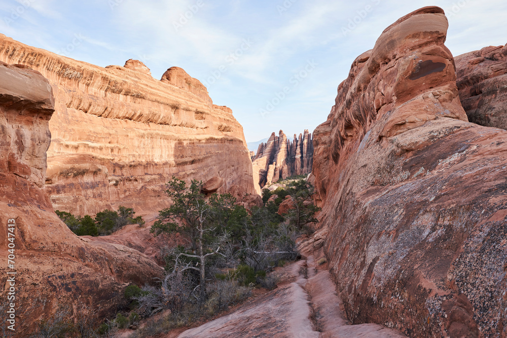 The primitive trail in arches national park leads toward rock fins. This section of the trail is located in the devil's garden section of the park. The primitive trail in arches national park leads toward rock fins. This section of the trail is located in the devil's garden section of the park.