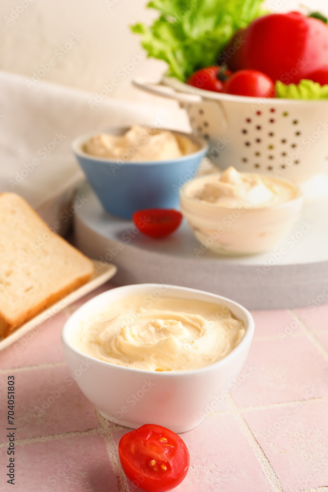 Bowl of tasty cream cheese on table Bowl of tasty cream cheese on table
