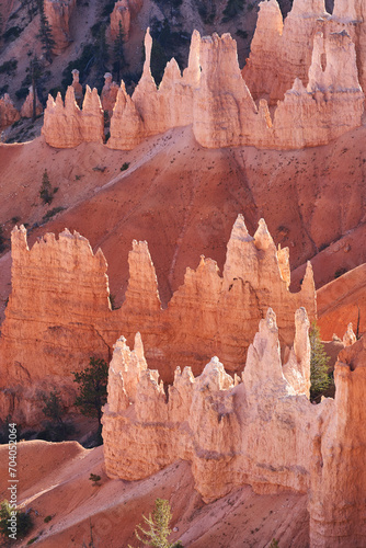 Several layers of unique rock formations called hoodos, beautifully glowing in the afternoon light.