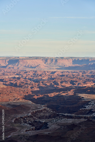 Evening draws in over Canyonlands National Park. The rock surface has been sculpted by the Colorado river, leaving steep cliffs and beautiful contrasts.
