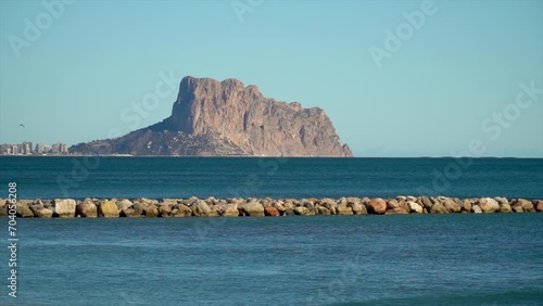 Slow motion, big mountain over Mediterranean sea, Peñón de Ifach, Calpe (Alicante, Spain)