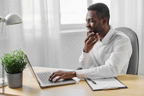 online man freelancer office american african manager job laptop education computer student