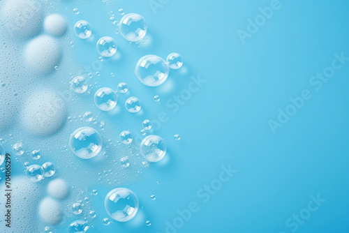 Soap foam  blue water surface texture with bubbles and splashes. Clear water abstract nature background  copy space for text