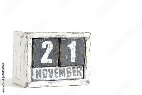 November 21 on wooden calendar, on white background.