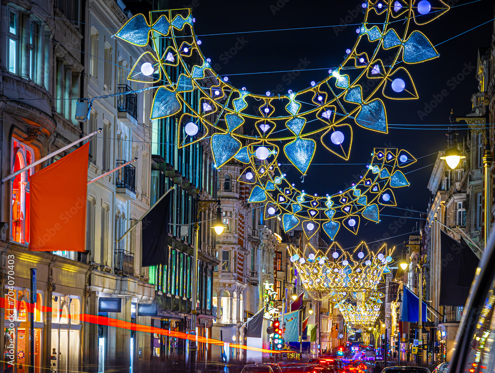 Obraz premium Crowded New Bond street decorated for Christmas, London, England