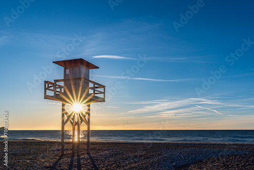 Beach surveillance tower on Poniente beach in Motril,Costa Tropical de Granada,Andalucia. photo