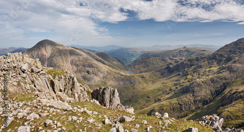 Panorma looking down from the summit of Scafell Pike towards Styhead Tarn and Borrowdale, with the summit of Great Gable on the left, Lake District, UK
