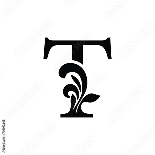 letter T. flower letters. Vintage ornament initial Alphabet. Logo vector  