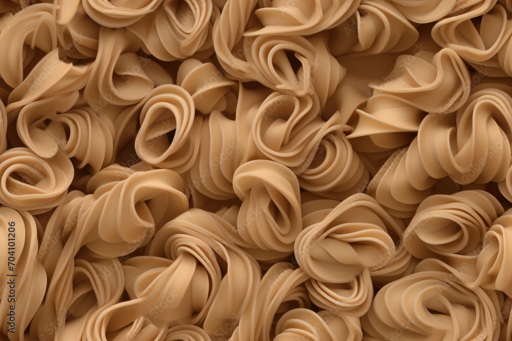 Close-up image of a pile of tan-colored pasta Close-up image of a pile of tan-colored pasta