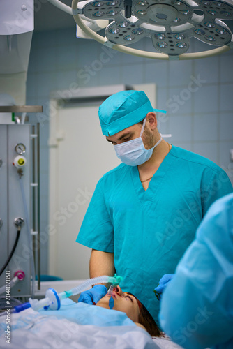 Plastic surgeons work in the operating room