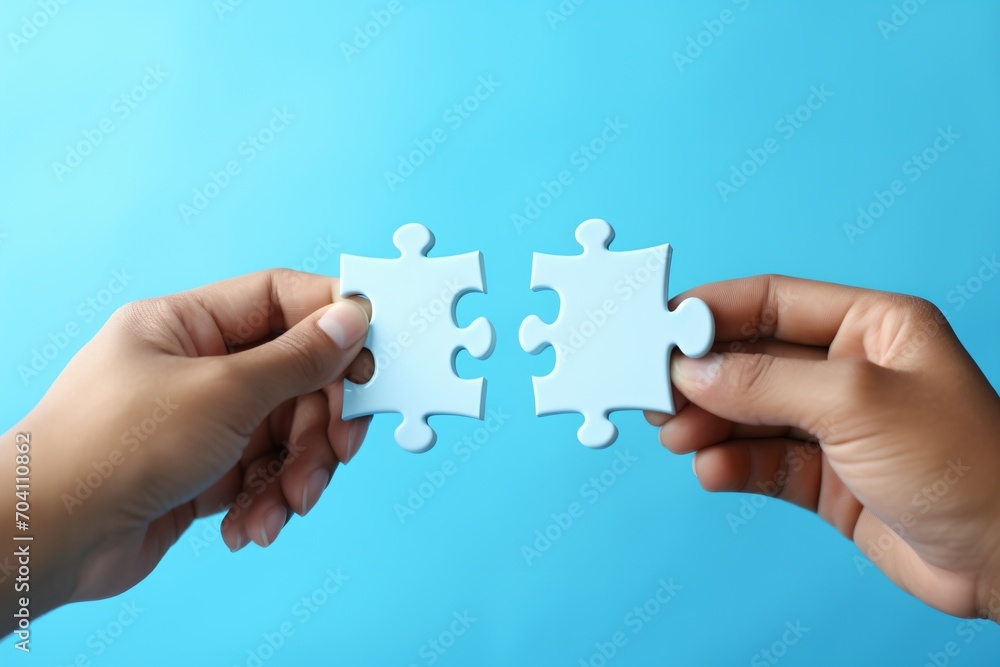 Two Hands Holding Puzzle Pieces to Complete the Puzzle, Two Hands Holding Puzzle Pieces to Complete the Puzzle,