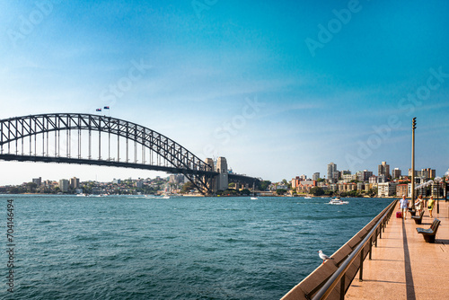 The Sydney Harbor Bridge is a heritage-listed steel through arch bridge, nicknamed The Coathanger because of its arch-based design and carries rail, vehicular, bicycle and pedestrian. Australia, 2019
