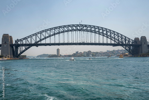 The Sydney Harbor Bridge is arch bridge, nicknamed The Coathanger and carries rail, vehicular, bicycle and pedestrian. Sydney, Australia, 2019