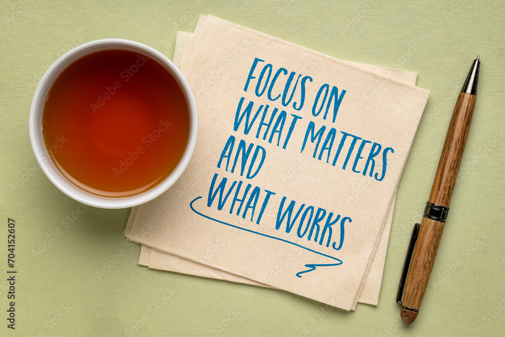 © MarekPhotoDesign.com - focus on what matters and what works - inspiraitonal writing on a napkin, productivity and priority concept