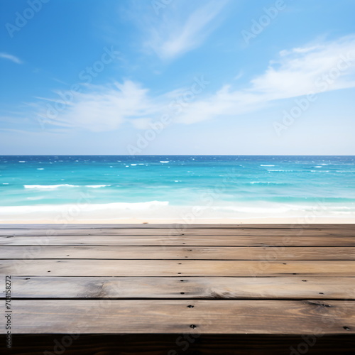 Wooden table with blurred beach and ocean background