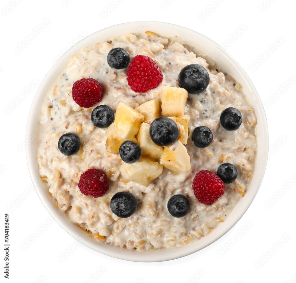 Tasty boiled oatmeal with berries and banana in bowl isolated on white, top view Tasty boiled oatmeal with berries and banana in bowl isolated on white, top view
