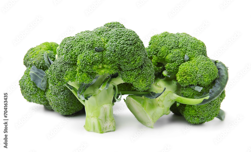 Pile of fresh raw green broccoli isolated on white Pile of fresh raw green broccoli isolated on white