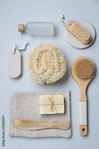 Bath accessories. Flat lay composition with personal care products on grey background