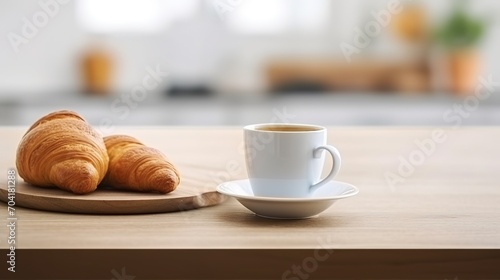 Freshly Brewed Coffee with Golden Croissants on a Wooden Table