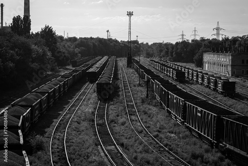 Railway station with freight trains filled with coal