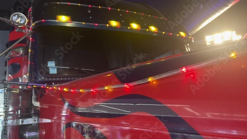 close-up light decorated red truck