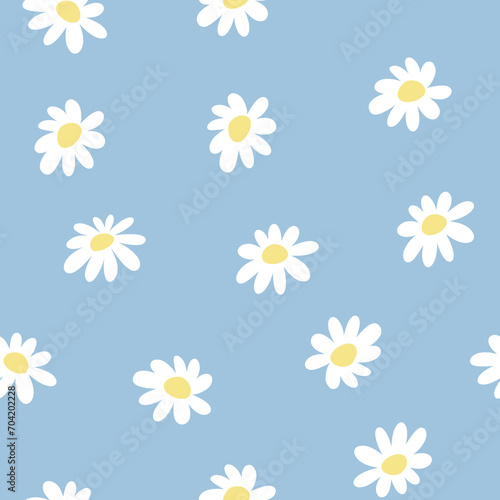 Scattered chamomile seamless pattern. Cute hand drawn isolated white flowers on baby blue pastel background. Sweet botanical floral allover print © Shakhnoza