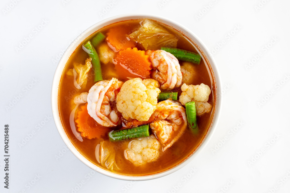 Sour curry with mixed vegetables and shrimp Sour curry with mixed vegetables and shrimp