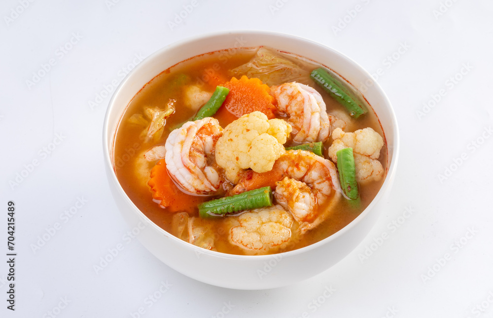 Sour curry with mixed vegetables and shrimp Sour curry with mixed vegetables and shrimp