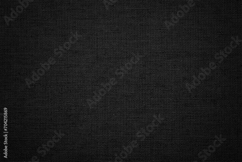 natural knitwear for fashion design or upholstered furniture. black fabric texture background