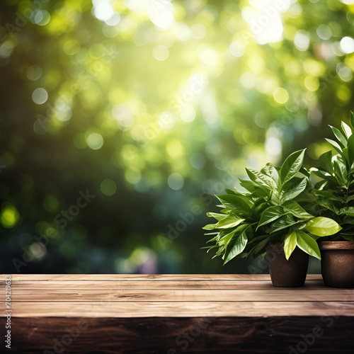 empty wooden table adorned with green leaves, blending warmth and nature's vibrancy. A visually inviting setting for showcasing fresh and natural products photo