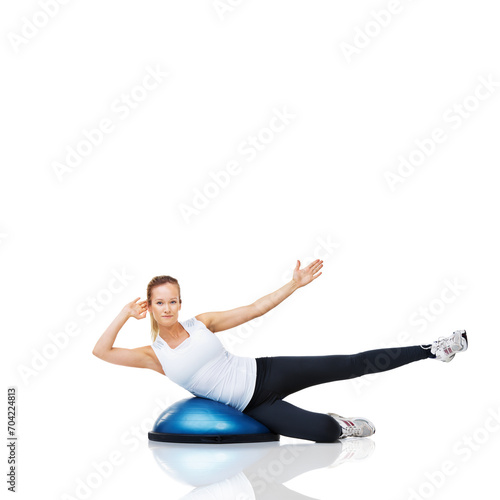 Woman, athlete and fitness with bosu ball for core training and muscle, balance and workout on white background. Exercise equipment, strength and endurance with mockup space and strong in studio