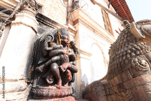 old stone statue of Hanuman in Bhaktapur durbar square, nepal photo