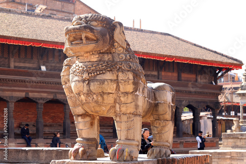 lion stone outside the  National Art Museum of Bhaktapur, a newar windows. it is one of museum in Bhaktapur durbar square. photo