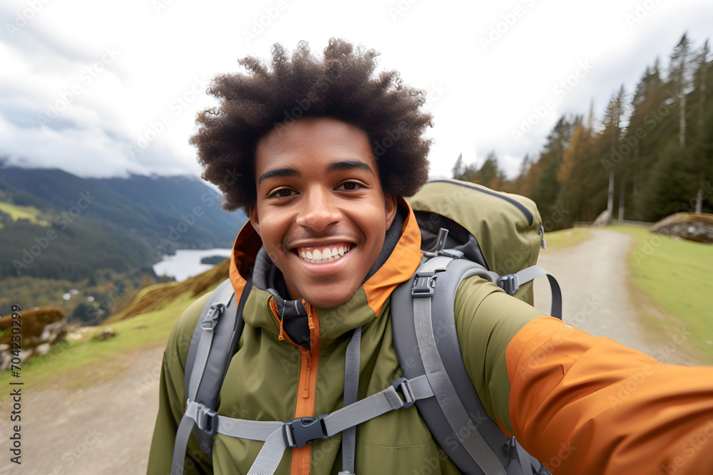 Happy traveller black teen with backpack taking selfie picture - Travel blogger Life style and technology concept