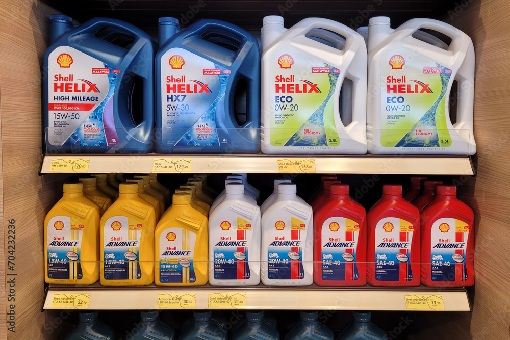 Shell Penang PENANG, MALAYSIA - 24 DEC 2023: A diverse selection of Shell motor oil ...