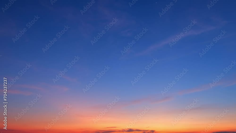 The sunrise sky transforms rapidly, clouds dancing in a time-lapse spectacle. A burst of colors emerges, painting the canvas of dawn. Nature concept. Timelapse.
The sunrise sky transforms rapidly, clouds dancing in a time-lapse spectacle. A burst of colors emerges, painting the canvas of dawn. Nature concept. Timelapse.