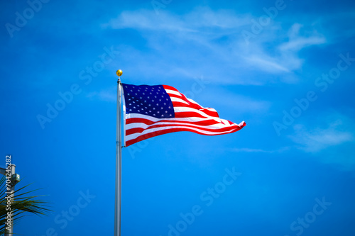 Explore the essence of American patriotism through captivating flag imagery. Discover high-quality photos of the American flag against various backgrounds, showcasing its significance. Immerse